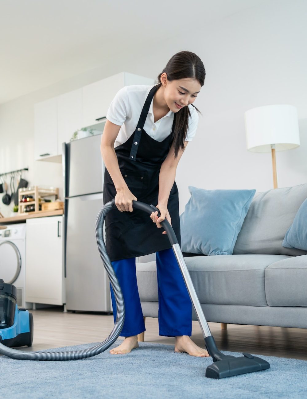 asian-cleaning-service-woman-worker-cleaning-in-living-room-at-home-.jpg